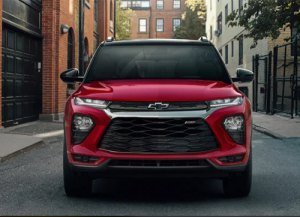 A red 2024 Chevrolet Trailblazer parked in an alleyway near Parsons, KS