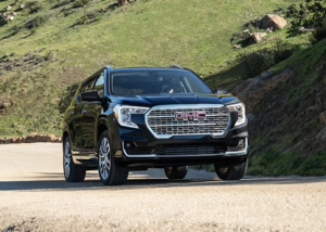 A 2024 GMC Terrain driving down a dirt road near Parsons, Kansas