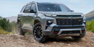 A grey 2025 Chevy Traverse offroading near Parsons, KS